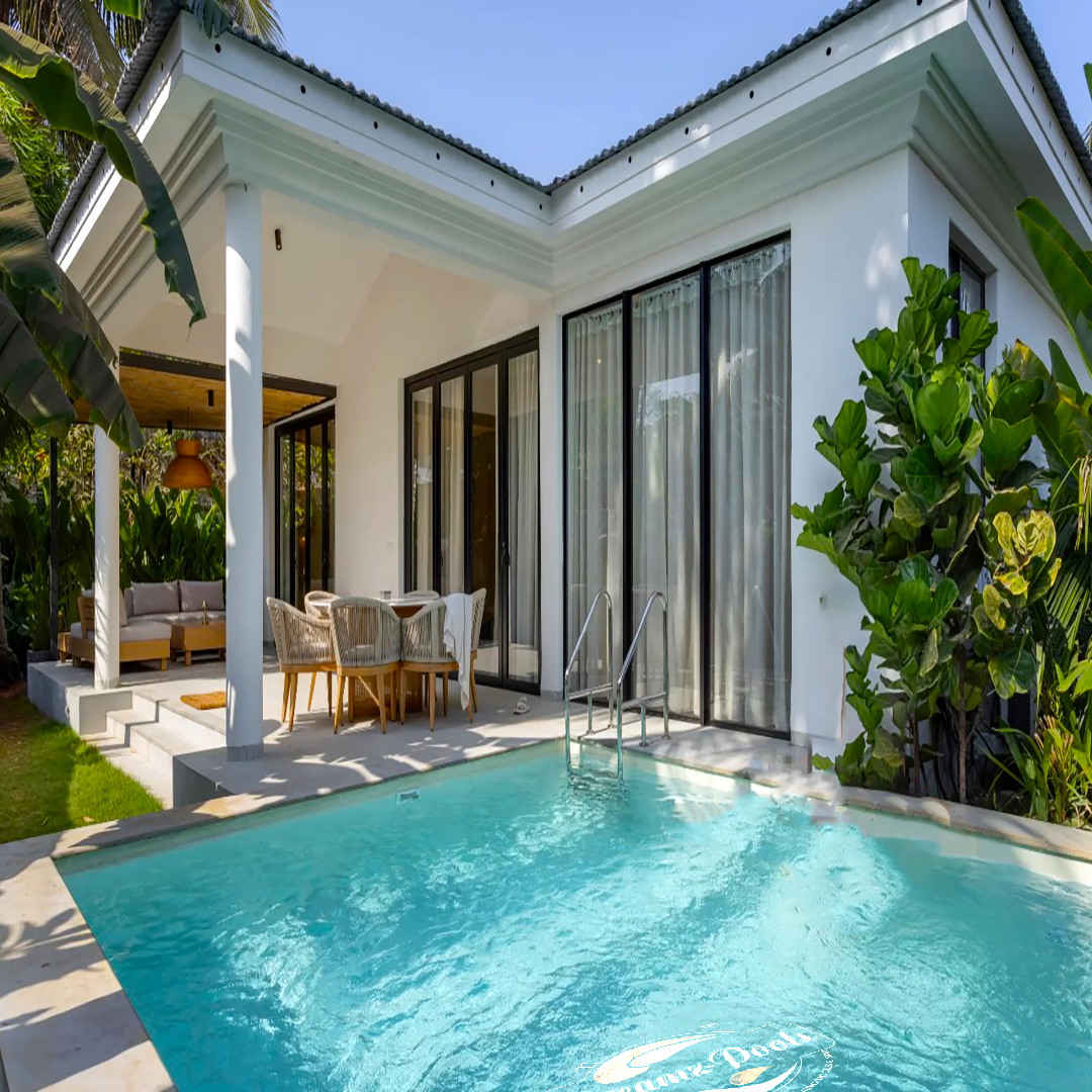 Pool contractor — Tropical villa plunge pool with banana plants and modern architecture