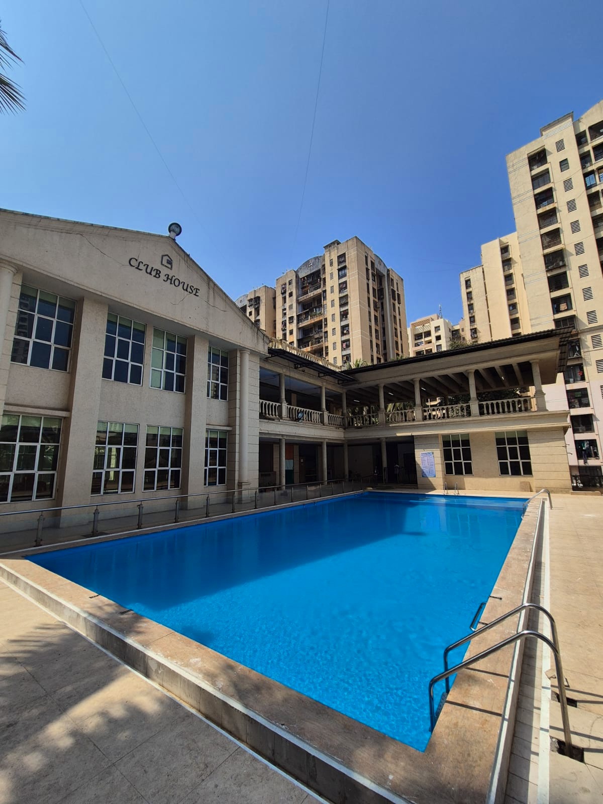 Pool contractor — Clubhouse community swimming pool